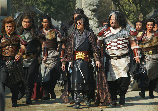 The man with the iron fists big hair